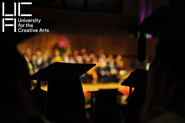 Image used for graduation email headers, shows a view of the stage at the RFH from the student seating area